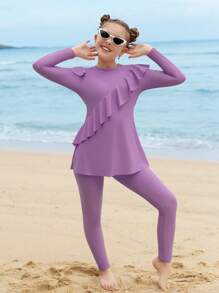 Conjunto de bikini modesto para niñas preadolescentes con manga larga y pantalón largo, con diseño vintage asimétrico y recorte con volantes