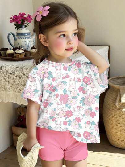 SHEIN Leap Crew Cute Pastoral Rabbit & Floral Print "Sparkle & Twirl" Pressed Flowers Sets, Boho Wildflowers, Plant Sets, Vintage Botanical Sets, Pastel Floral Nature Sets, Baby Girl Casual Minimalist Round Neck Short Sleeve T-Shirt And Fitted Shorts Set, Suitable For Spring/Summer