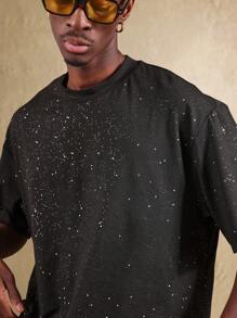 SUMWON Camiseta oversize con estampado de galaxia, diseño cósmico con chispas, apta para usarse en festivales, conciertos y eventos, con patrón celestial, uso unisex - Negro - Ver 5