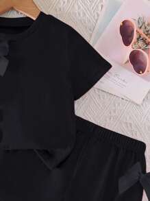 SHEIN Elladie kids 2件装少女粉色休闲时尚甜美日常圆领短袖T恤蝴蝶结装饰松紧腰短裤套装女童衣服女童蝴蝶结衣服女童套装两件套女童短款套装 - 黑色 - 查看 6