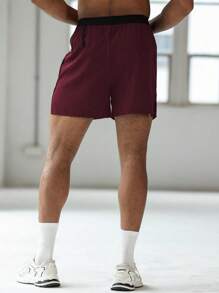 Manfinity Sport Corelite 男士休闲撞色印花侧开衩运动短裤骑行短裤跑步短裤