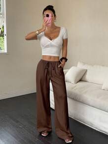Flirla Pantalones casuales de verano para mujer de unicolor con cintura elástica, cordón y bolsillos