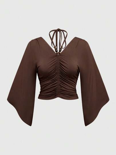 Hippie T-shirt vintage ample à col en V avec décoration de perles de bois et manches chauve-souris pour femmes