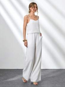 CLARA VERO Conjunto de 2 piezas de mujer con Top sin mangas de tela de bambú tejida de unicolor con detalles de pompones y pantalones rectos de pierna ancha con bolsillos laterales y pliegues delanteros. Outfit de primavera y verano para vacaciones y salidas