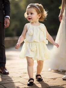 Bộ đồ 2 món áo không tay họa tiết hoa và quần short cho bé gái, mùa hè 2025 - Màu be - Xem 3