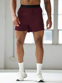 Manfinity Sport Corelite 男士休闲撞色印花侧开衩运动短裤骑行短裤跑步短裤