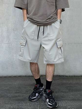 Prep Pantalones cortos casuales de longitud hasta la rodilla con múltiples bolsillos, de corte holgado para hombre