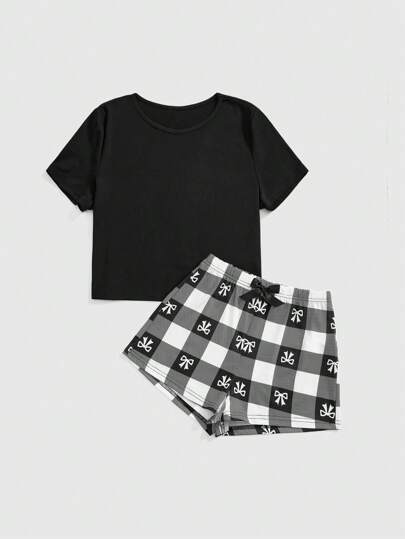 Set pigiama casual con maniche corte con fantasia a scacchi bianchi e neri a tema farfalla