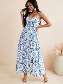 Kiitan Luxe Robe longue femme à ligne évasée avec imprimé floral éclat bleu et bretelles en nœud, idéale pour l'été et les vacances
