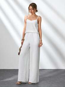 CLARA VERO Conjunto de 2 piezas de mujer con Top sin mangas de tela de bambú tejida de unicolor con detalles de pompones y pantalones rectos de pierna ancha con bolsillos laterales y pliegues delanteros. Outfit de primavera y verano para vacaciones y salidas