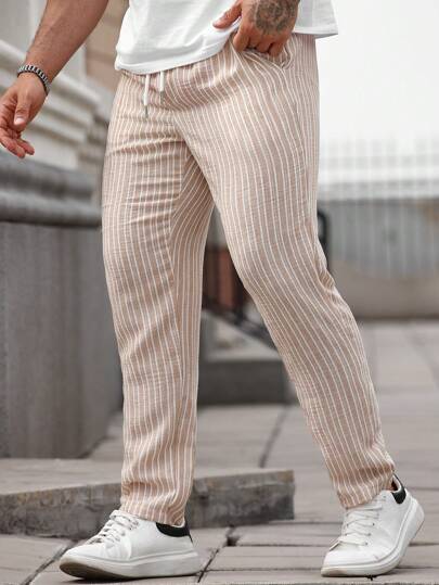 Manfinity RelaxMax Pantalones casuales con estampado de rayas, bolsillo y cordón en la cintura para hombres