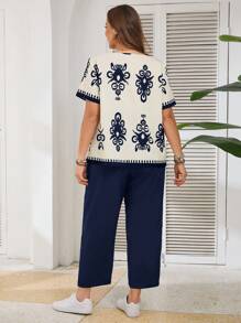 SHEIN LUNE Set casual da 2 pezzi, camicia a maniche corte con stampa floreale e pantaloni, taglie forti per donne