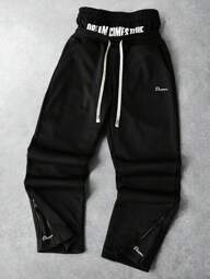 PAVTROS Manfinity Streetrush Herren Jugendlicher Straßensport-Stil, INS passend zu High Street Schwarz 2-in-1 Design Jogginghose mit Taillenbund und Reißverschlussdetails an den Knöcheln. Diese weit geschnittenen Hosen zeigen einen "Träume werden wahr" Slogan und verkörpern Street Rock Ästhetik. Sie sind perfekt für Musikfestivals und den Alltag und machen ein ausgezeichnetes Geschenk für Freund oder Ehemann.