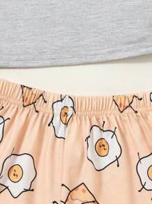 SHEIN 2 piezas Conjunto de pijama holgado de punto con camiseta de manga corta cuello redondo y pantalones cortos con estampado de dibujos lindos para niña, ropa de verano para el hogar