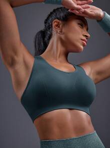 Powerista حمالة صدر رياضية للنساء ذات لون أحادي بتصميم بسيط ومريح - أخضر عسكري - مشاهدة 5