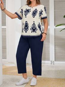 SHEIN LUNE Set casual da 2 pezzi, camicia a maniche corte con stampa floreale e pantaloni, taglie forti per donne