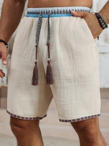 Manfinity RSRT 男士休闲日常沙滩度假装，经典波西米亚风休闲短裤，采用仿亚麻纹理面料和图案织带制成，配有抽绳腰带，非常适合夏威夷海滩度假、音乐节和日常穿着。