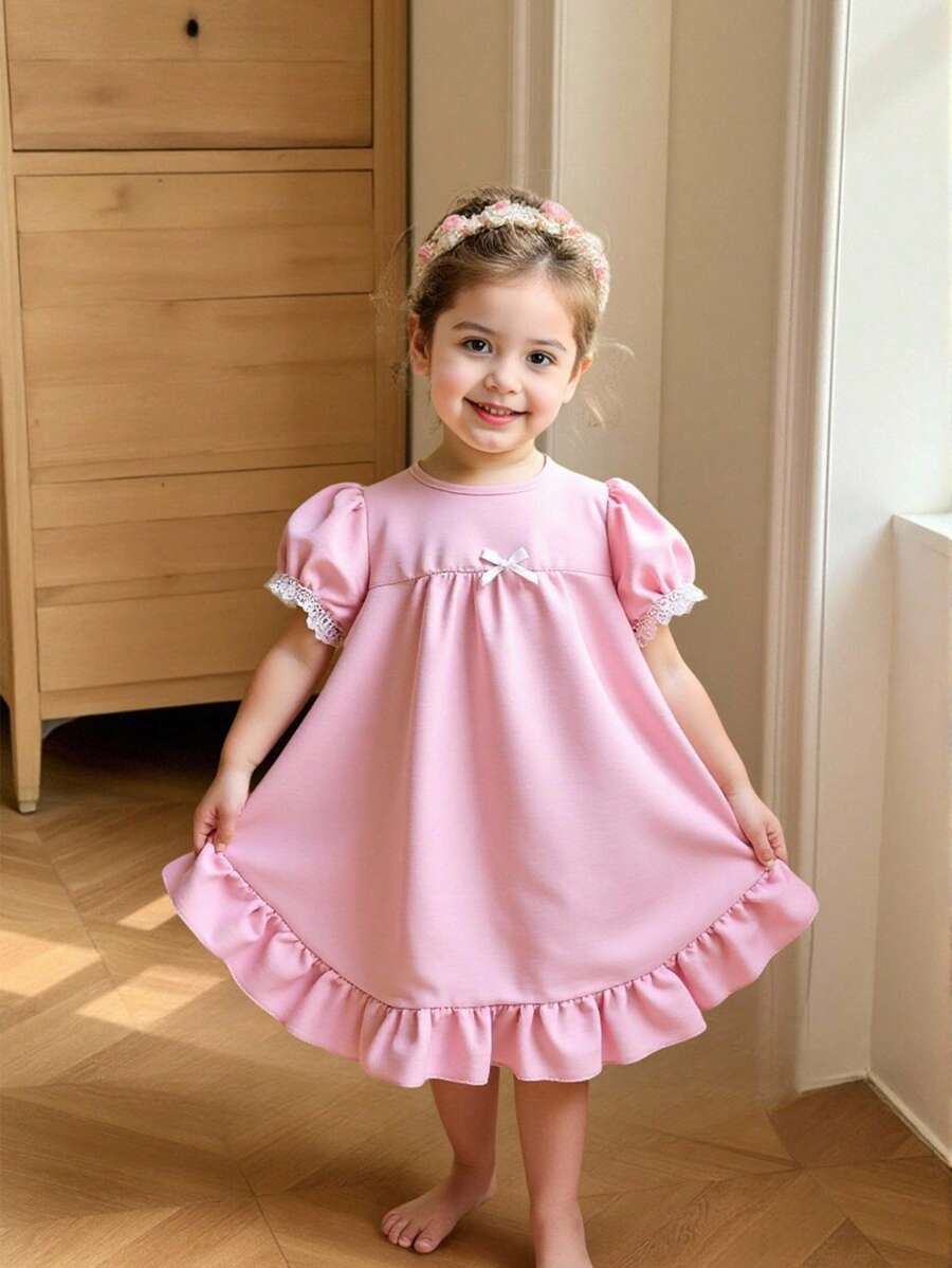 Áo ngủ dài tay ngắn màu trắng cho bé gái, có bèo nhún ở gấu và nơ xinh xắn. - Hồng - Xem 1