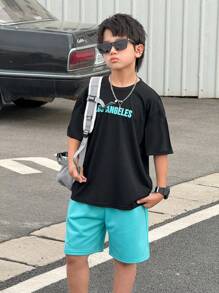 Set de 2 piezas de camiseta de manga corta con estampado de letra y pantalones cortos de ajuste suelto, estilo calle casual y cómodo para niños preadolescentes, apropiado para escuela, jardín, playa, cumpleaños, primavera, verano, otoño, invierno