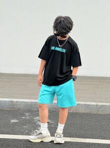 Set de 2 piezas de camiseta de manga corta con estampado de letra y pantalones cortos de ajuste suelto, estilo calle casual y cómodo para niños preadolescentes, apropiado para escuela, jardín, playa, cumpleaños, primavera, verano, otoño, invierno