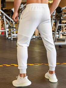 Manfinity Homme Men's Solid Color Sweatpants, Fashionable Summer White Joggers, Athletic Breathable Stretchy Sweatpants For Gym