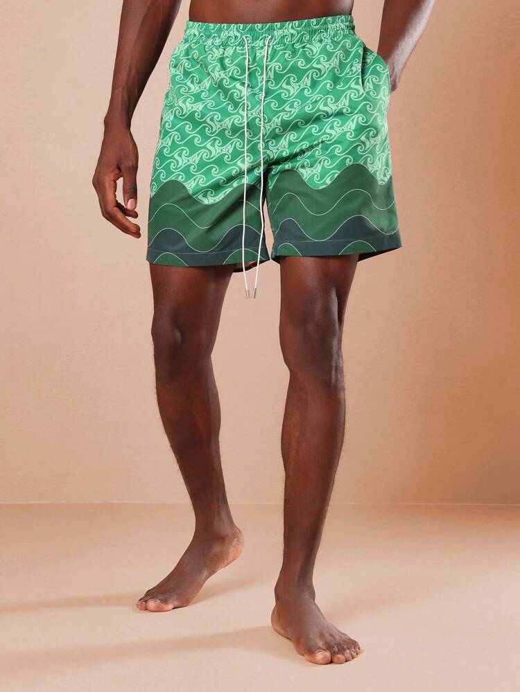 Mittellange Badeshorts mit Wellenmuster und Kordelzug
