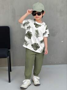 SHEIN 2pcs/Set Young Boy Vacation Casual Floral Print T-Shirt & Solid Color Pants Set