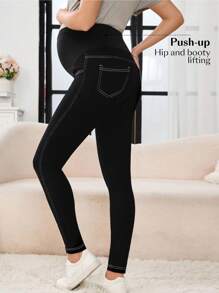SHEIN Jeans ajustados para maternidad con bolsillos inclinados y cintura ajustable