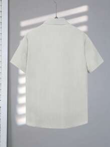 SHEIN Manfinity Dauomo Camisa informal y versátil para hombre de manga corta y unicolor