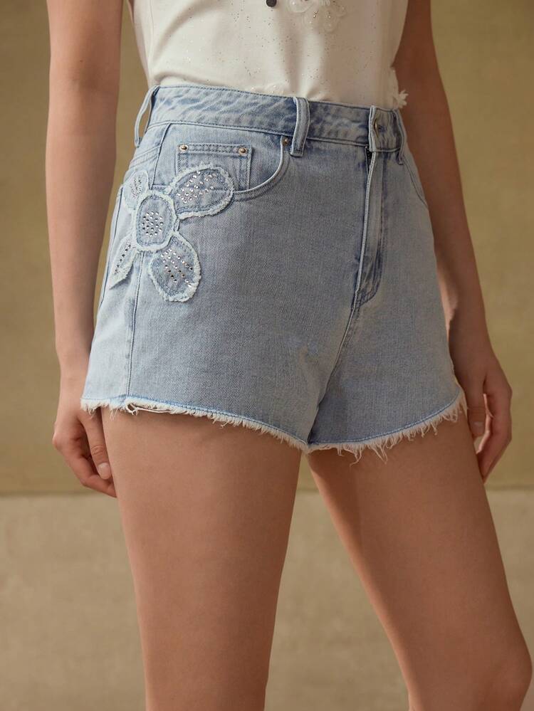 RHINESTONE FLORAL RAW EDGE DENIM SHORTS