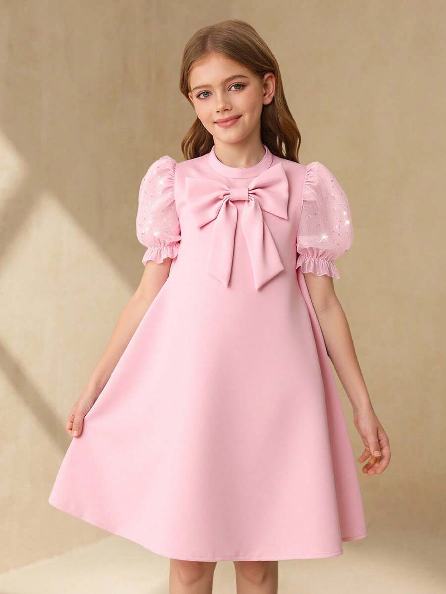 圆领、蝴蝶结装饰、泡泡袖、网眼布、优雅且有设计感的 Tween 女童派对连衣裙