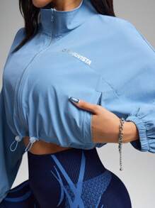 Innovista 轻便拉链运动夹克，宽松版型，适合热身、短款健身上衣、宽松版型、带口袋、防紫外线、防风、蓝色、举重、力量训练套装、哑铃、户外、骑行、跑步、有氧运动、瑜伽和普拉提、拳击、徒步旅行、网球和高尔夫、运动装备、健身服和运动套装、都市休闲运动、时尚偶像、时尚达人、闪耀动人、适合音乐节和派对、街头性感、日常必备、TikTok运动服、激励秋季女装，清爽浅蓝色 - 淺藍色 - 查看 5