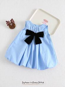 Cozy Pixies Robe décontractée et polyvalente pour bébé fille nouveau-né avec col rond et sans manches, décorée d'un nœud