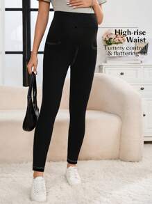 SHEIN Jeans ajustados para maternidad con bolsillos inclinados y cintura ajustable