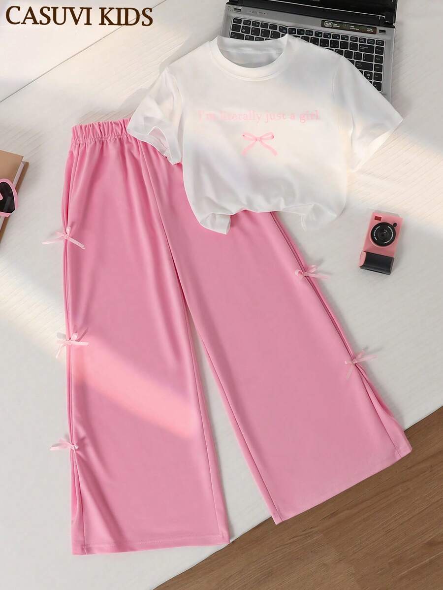 Sparklyn 两件套，少女白色短款T恤和粉色阔腿蝴蝶结裤，适合校园生活和日常穿着。 - 彩色 - 查看 1