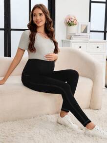 SHEIN Jeans ajustados para maternidad con bolsillos inclinados y cintura ajustable
