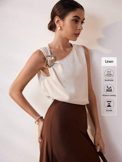 Uhlyne Camisa casual/de trabajo para mujeres de moda, sin cuello, sin mangas, con nudo delantero y decoración de metal