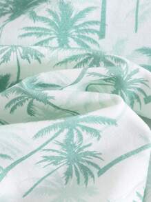 Cozy Pixies طقم (2 قطعة) من ملابس علوية ذو رقبة دائرية وأكمام قصيرة مع طباعة زهور وأشكال نباتية، وشورت خصر مطاطي للأطفال الصغار