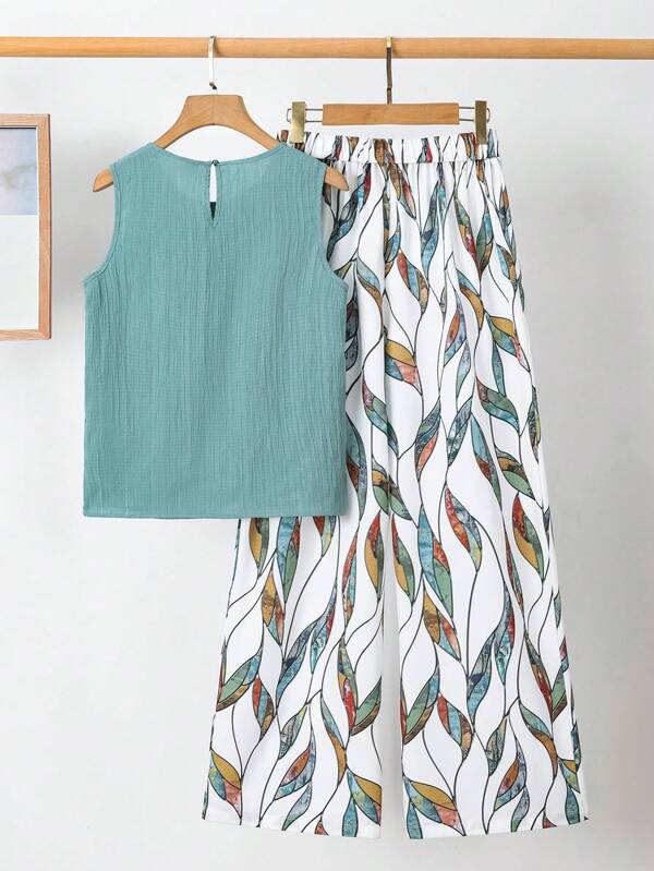 SHEIN Clasi Elegante effenkleurige geplooide blouse voor dames en een set met wijde broek met bloemenprint