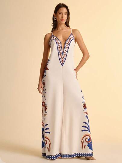 CAJUNI Mono de mujer con cuello en V y tirantes de espagueti con estampado de plantas tropicales, flores y pájaros sobre una base de color albaricoque, vestimenta casual de vacaciones