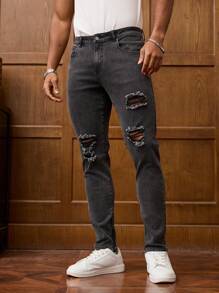 Manfinity Homme Herrjeans med slitna fickor och casual skinny jeans - Grå - Visa 1