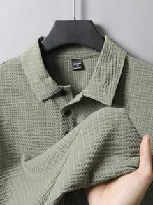 Manfinity Homme Camisa polo de manga corta de hombre de verano de color liso y textura de malla