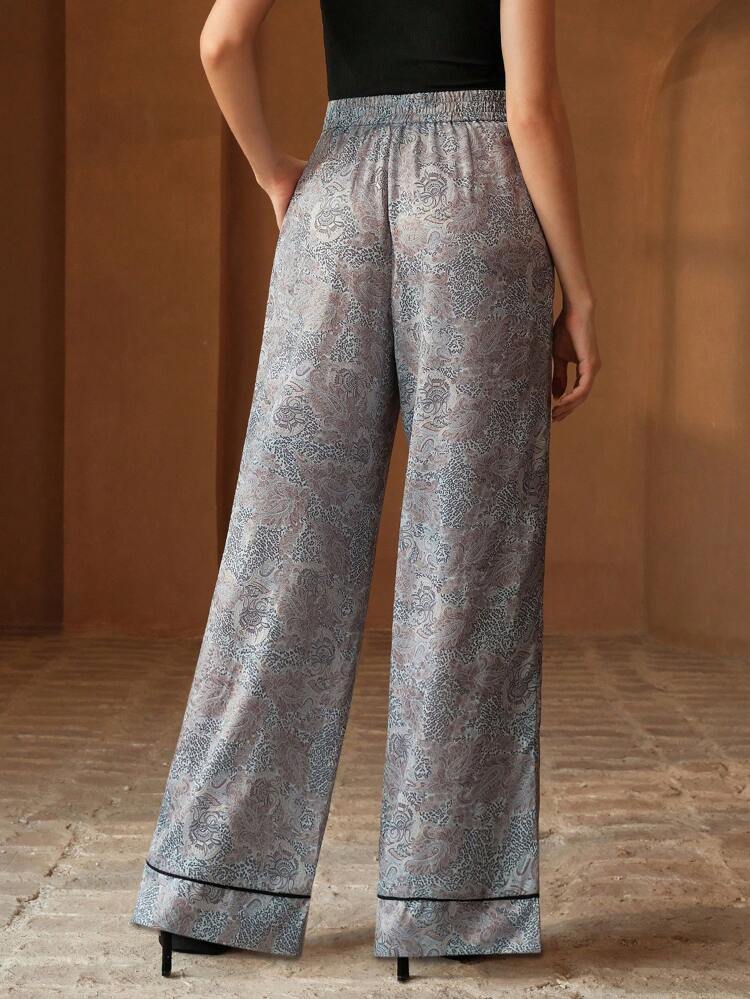 Women's Boho Wide Leg Pants Long Flowy Polyester Trousers With Abstract Print And Zipper Detail