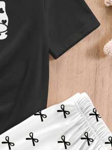 SHEIN Ensemble de vêtements de nuit en 2 pièces pour préadolescentes : t-shirt à col rond à manches courtes avec motif graphique minimaliste en nœud papillon et pantalon large à jambe droite - Multicolore - Voir 5