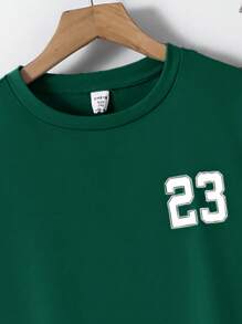 SHEIN Set de 2 piezas de camiseta de manga corta con cuello redondo estriado y pantalón hasta el tobillo con estampado versátil informal para niños y preadolescentes