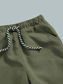 SHEIN 2pcs/Set Young Boy Vacation Casual Floral Print T-Shirt & Solid Color Pants Set