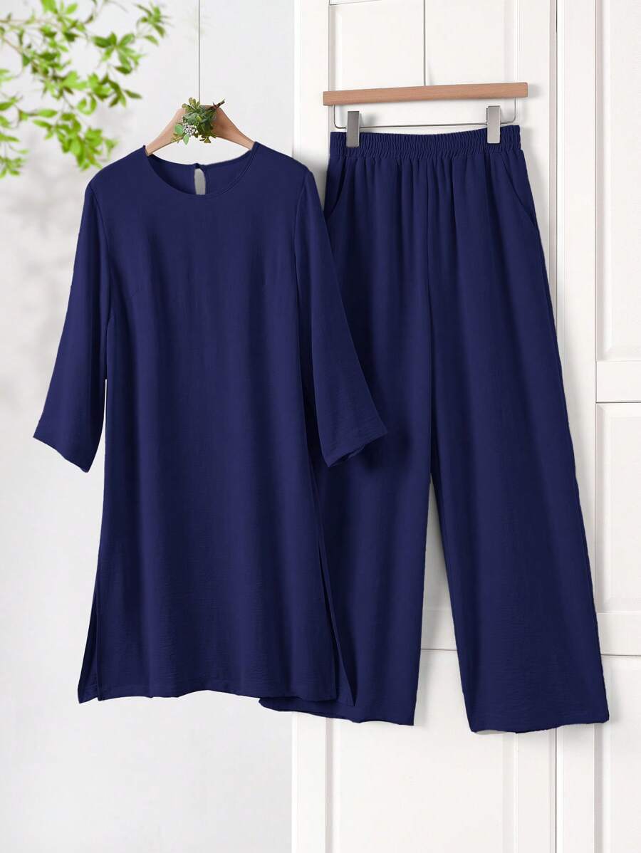 Rusticease Bộ đồ vải dệt trơn màu xanh navy với áo thun cổ tròn và quần xẻ tà hai mảnh dành cho nữ Bộ đồ 2 món thoải mái dành cho nữ Bộ đồ hai mảnh quần dành cho nữ - Màu xanh hải quân - Xem 1