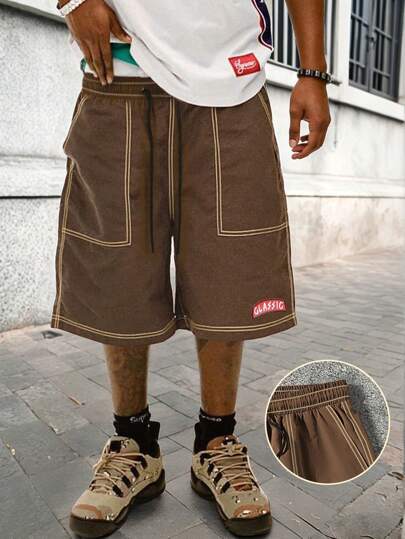 Manfinity EMRG 男士字母印花抽绳腰口袋阔腿短裤，街头潮流