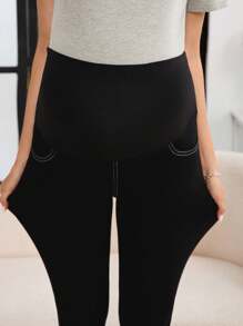 SHEIN Jeans ajustados para maternidad con bolsillos inclinados y cintura ajustable