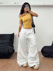 Coolane 女式不对称领口纯色短款休闲夏季时尚 T 恤，黄色上衣